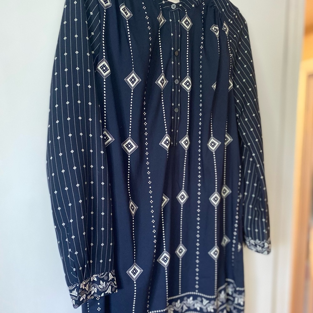 Long sleeve Dress in navy with geometric print and floral trim